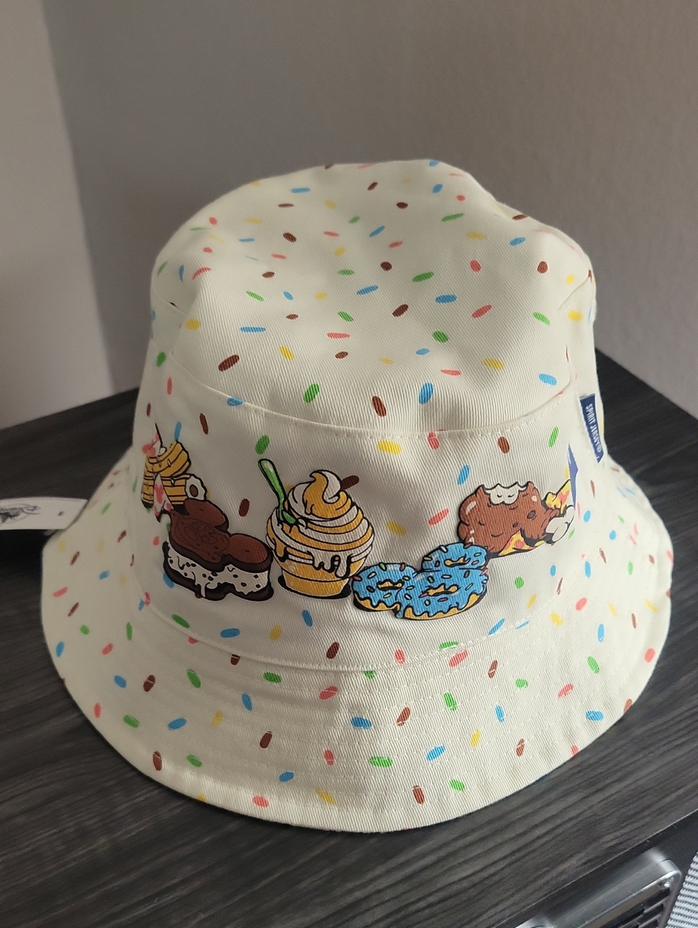 Disney Cream Bucket Hat with Colorful Snack Print-Reversible